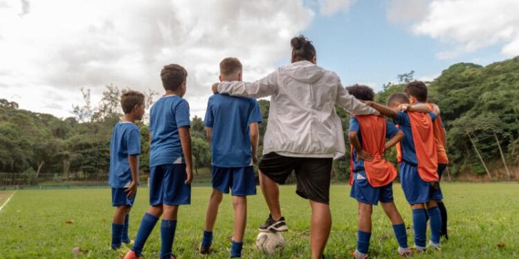 Entrenador de equipo de jóvenes